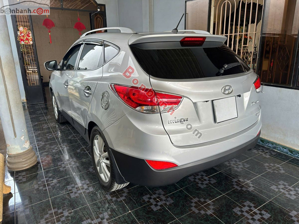 Bán ô tô Hyundai Tucson 2.0 AT 4WD - 2012 - xe cũ