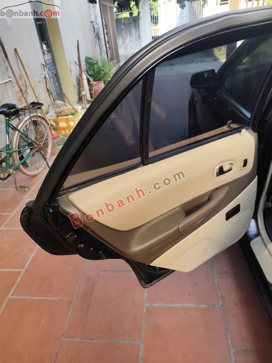 Bán ô tô Ford Laser GHIA 1.8 AT - 2004 - xe cũ