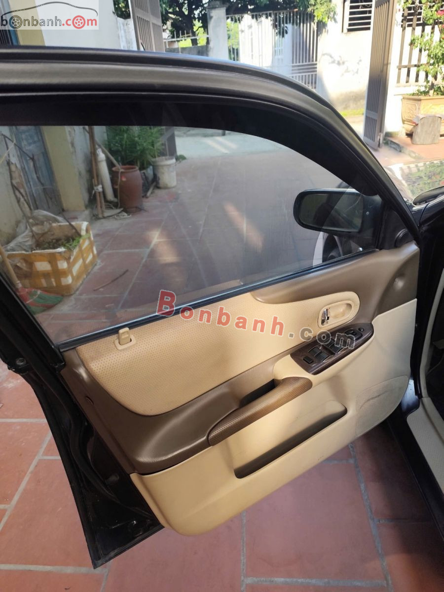 Bán ô tô Ford Laser GHIA 1.8 AT - 2004 - xe cũ