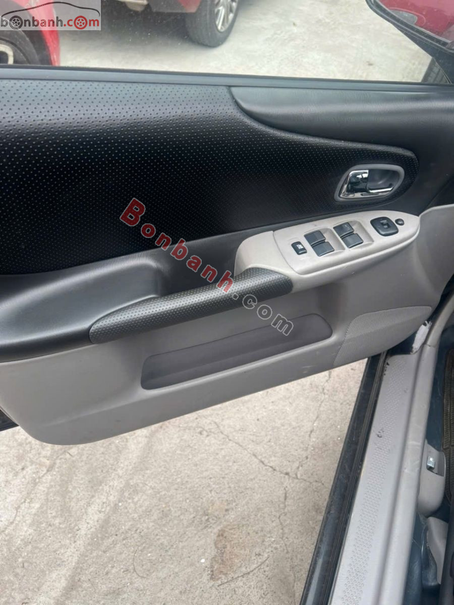 Bán ô tô Ford Laser GHIA 1.8 MT - 2003 - xe cũ