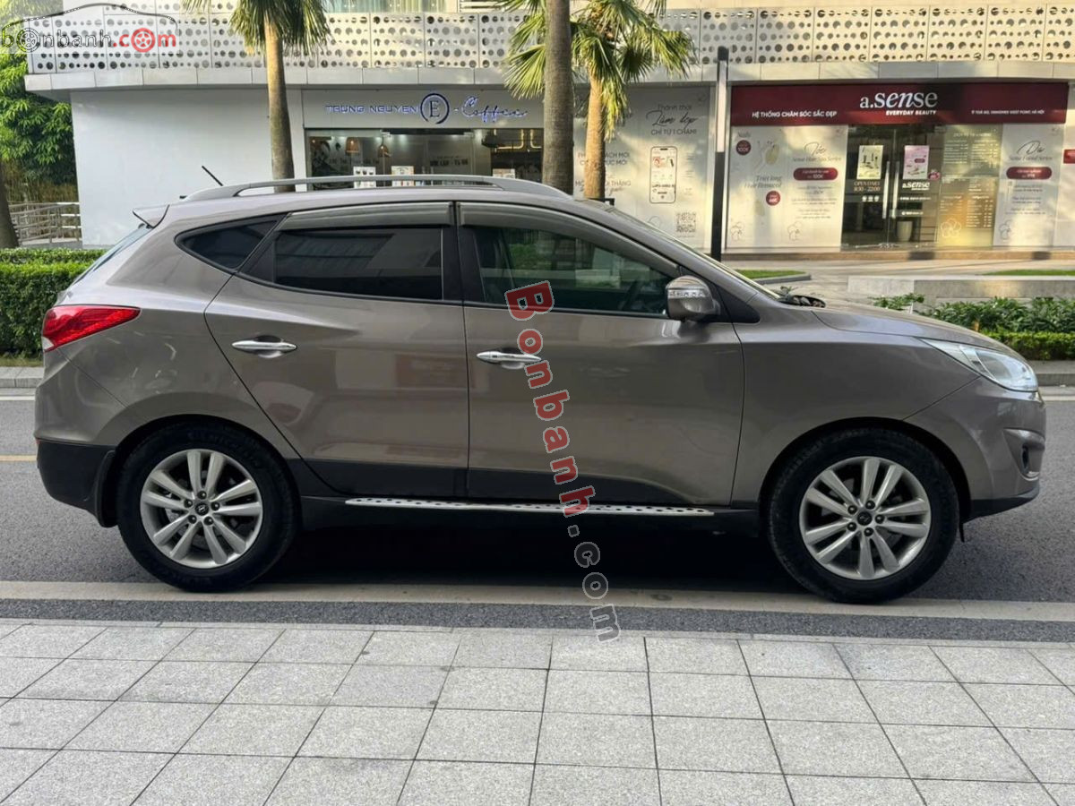 Bán ô tô Hyundai Tucson 2.0 AT 4WD - 2011 - xe cũ