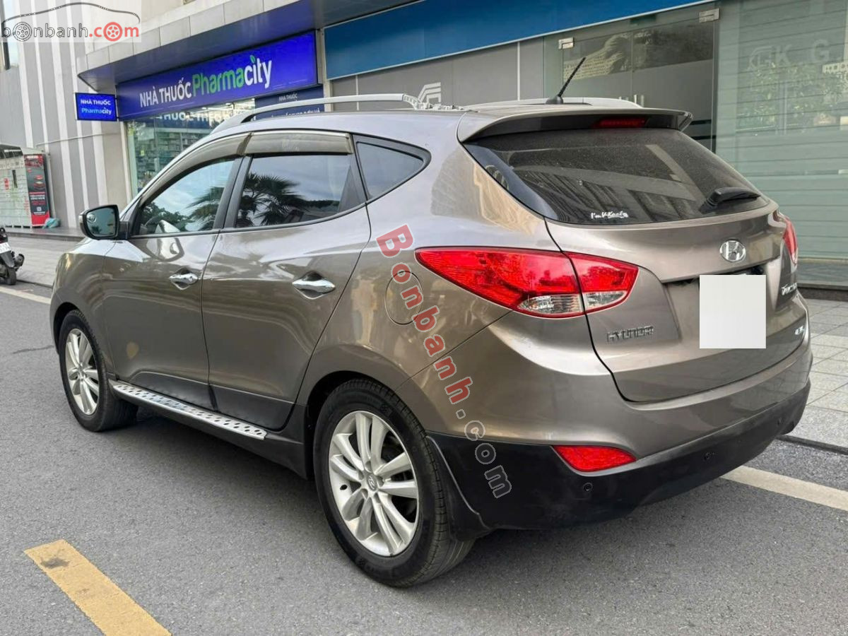Bán ô tô Hyundai Tucson 2.0 AT 4WD - 2011 - xe cũ